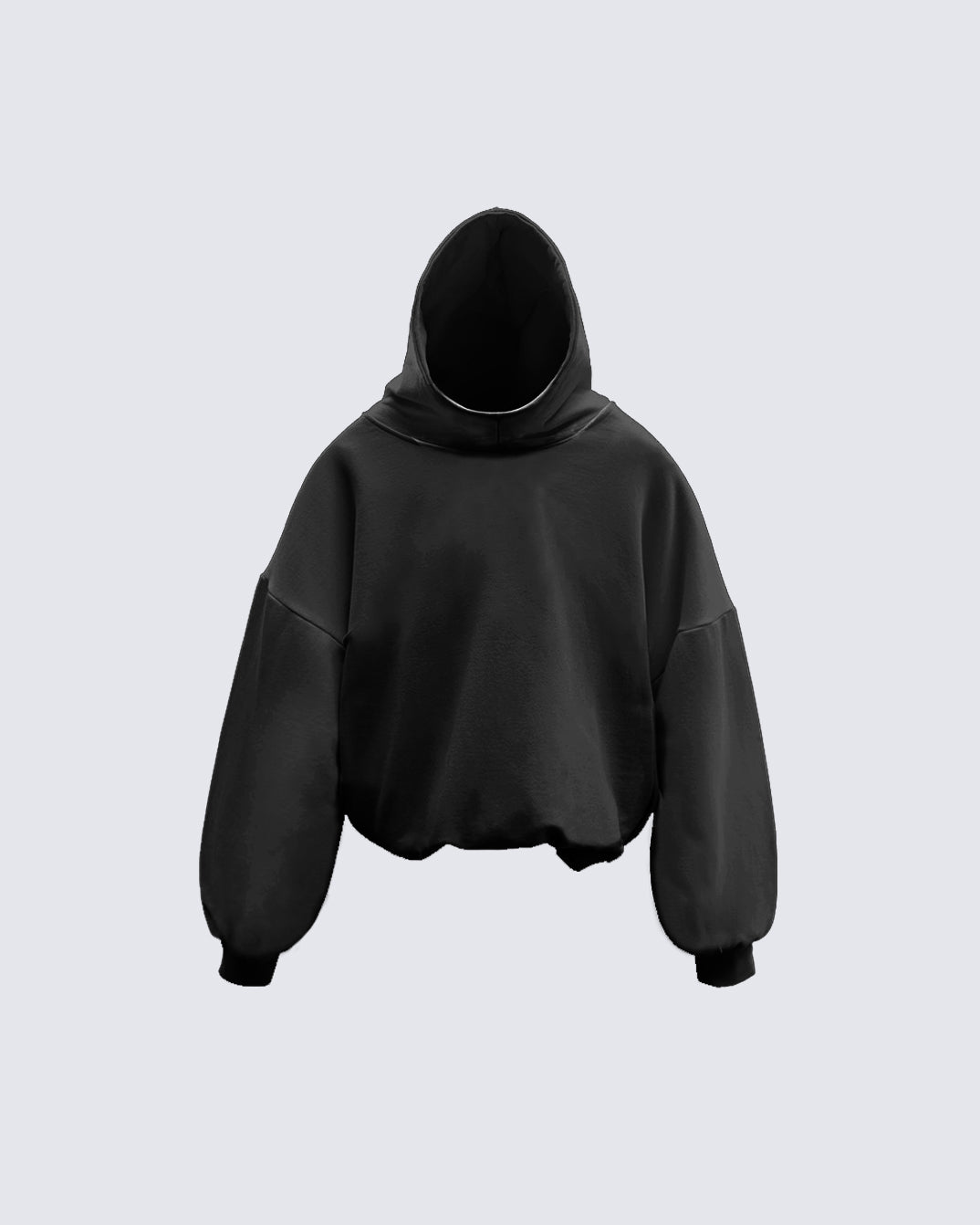 Cozy black hoodie by KIIKIO, featuring a minimalist design and oversized fit, ideal for relaxed street fashion and comfort.